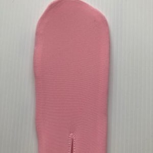 May include: A close-up of a pink fabric sock with a seam down the centre.