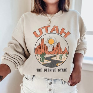 Utah The Beehive State Sweatshirt | Desert Vibe Travel Road Trip | Personalized Gift | Custom Design Unisex Heavy Blend Crewneck Sweatshirt