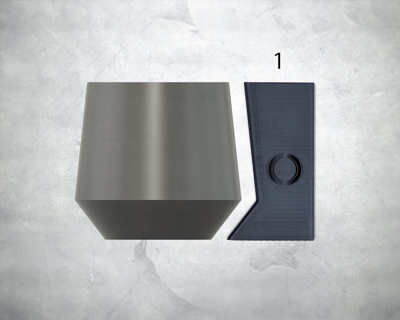 May include: Two gray metal bottle stoppers, one with a round top and the other with a flat top. The flat top stopper has a circular cutout.