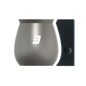 May include: A gray metal wine glass with a white number "3" on the side. The glass is next to a black wine stopper with a round opening.