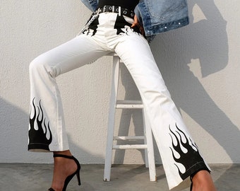 jeans with flames on the bottom