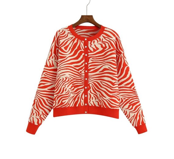 red animal print cardigan