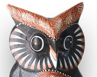 Owl hand carved from pine wood and lightly painted in different sizes