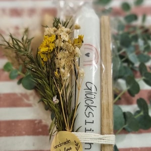 Candle with the inscription (Lucky Light)