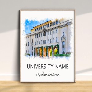 May include: Watercolor print of a university building with arched entryways and a blue sky background. The print is framed and features the text "UNIVERSITY NAME" and "Pasadena, California". The building is a light beige color.