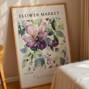 a large framed poster of a floral design, with the text "FLOWER MARKET" prominently displayed at the top.