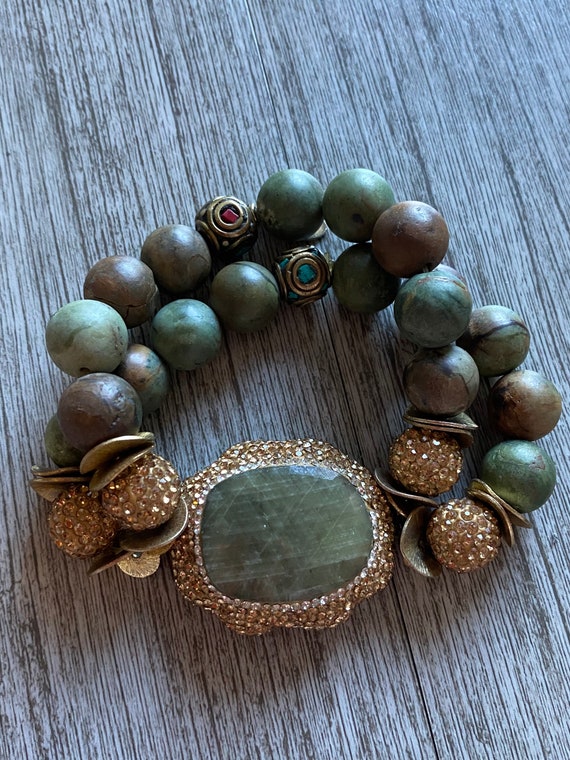 Double strand bracelet, small beads, has large mi… - image 1