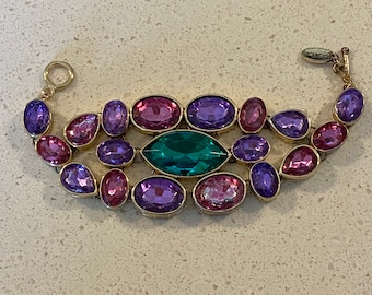 CN Scaasi stunning bracelet from the 1980’s  purple, pink & large green center. Stunning never had any repairs done..