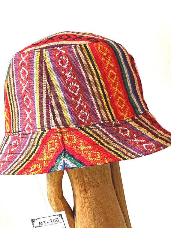 Vibrant striped bucket hat with leaf design. REVERSIBLE JAMAICA WEED LEAF FISHERMAN BUCKET BUSH SUN CAP  main image 4