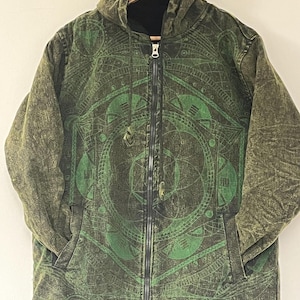 May include: A green hooded jacket with a geometric pattern and a black zip. The jacket has a fleece lining.