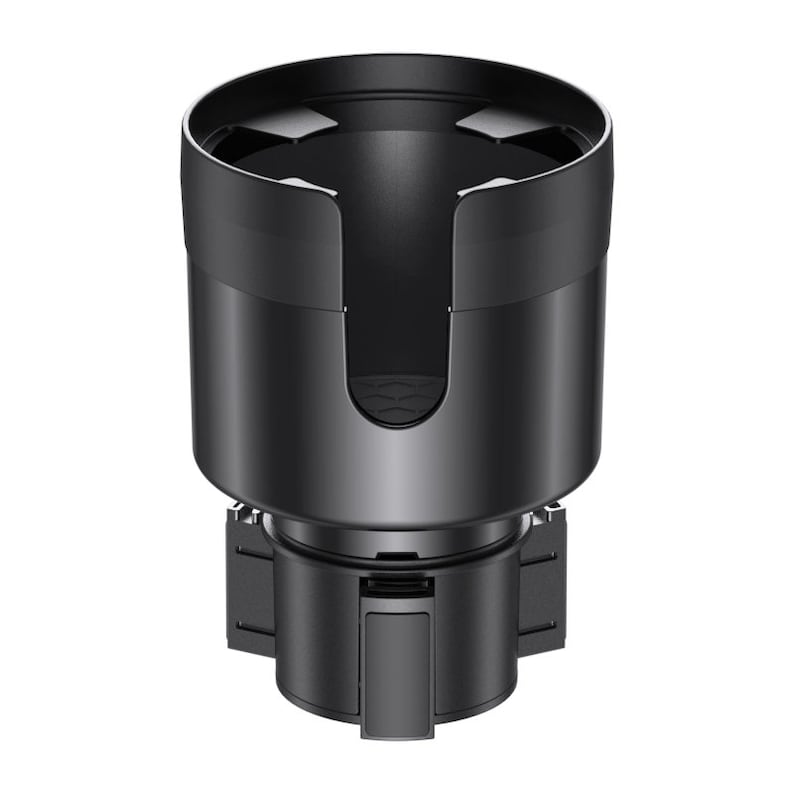 May include: Black car cup holder with a spring-loaded mechanism to secure a cup or bottle. The holder has a black plastic base and a black metal cup holder.