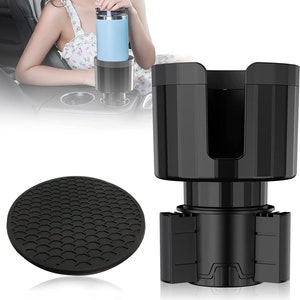 May include: Black car cup holder with a non-slip base. The cup holder has a spring-loaded mechanism to adjust to different cup sizes. The base is designed to prevent the holder from sliding around in the car.
