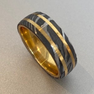 Custom made Damascus steel 8mm Wedding Band - four steels and double rose gold copper bands