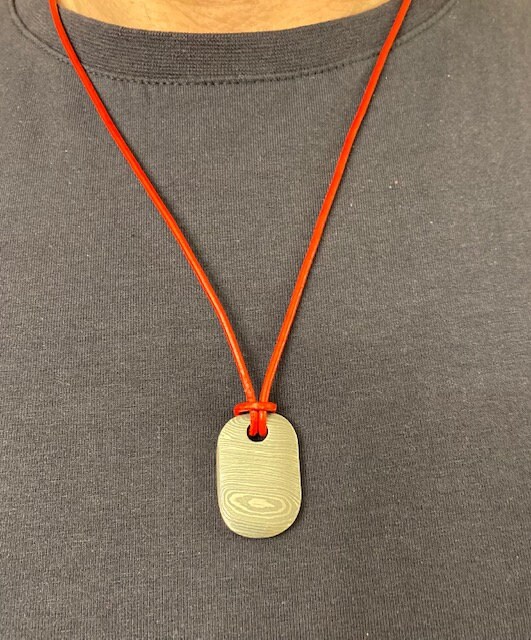 Custom made 'Dog Tag' Style Damascus pendant necklace - four steels hand forged together