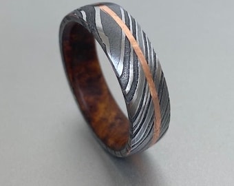 Custom made Damascus steel 8mm Wedding Band - four steels, with a single rose gold copper band
