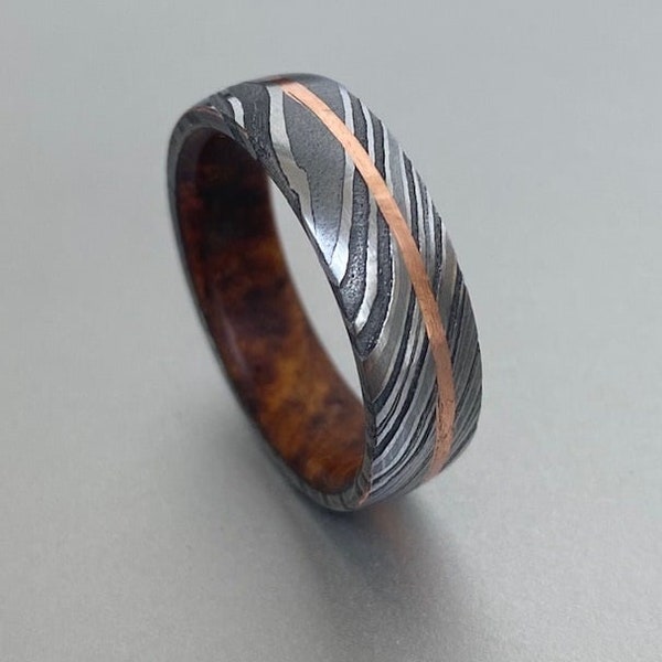 Custom made Damascus steel 8mm Wedding Band - four steels, with a single rose gold copper band