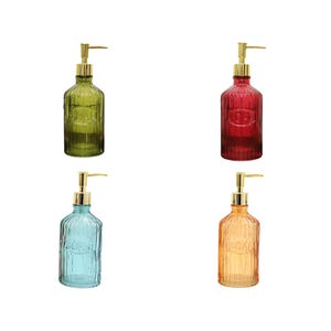 May include: Four glass soap dispensers with gold pumps. The dispensers are in four different colors: green, red, blue, and orange.