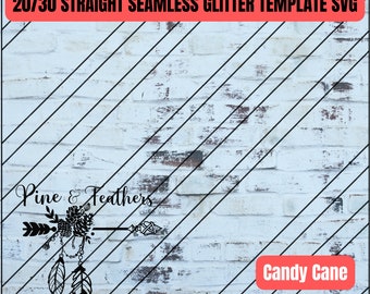 May include: Black and white graphic design of a pine cone and feathers with an arrow pointing to the right. The text "Pine & Feathers" is above the design. The text "Candy Cane" is in the bottom right corner of the image. The background is a white brick wall with black diagonal lines.