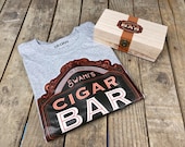 Personalized 39 Cigar Bar Logo 39 T-shirt Packaged in a Wooden Cigar Box w stained wood stripe personalized logo on box. Great gift idea .