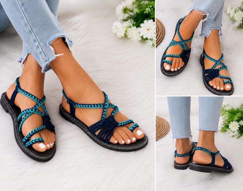 May include: Flat sandals featuring a dark blue and teal braided strap design with a toe loop and an adjustable ankle strap. The footwear has a black sole and a multi-strap construction that secures the foot across the top and around the heel.