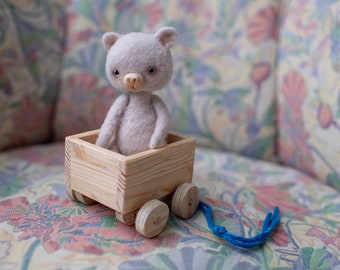 Needle felted teddy bear in a cart, felt ornament bear, collection toy