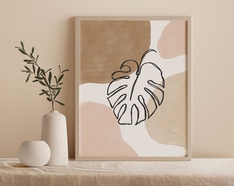Könnte beinhalten: Ein gerahmter Druck mit einer minimalistischen Linienzeichnung eines Monstera-Blattes auf einem Hintergrund aus abstrakten Formen in Braun- und Rosatönen.