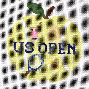 May include: Needlepoint canvas featuring a yellow apple design with the text "US OPEN" in navy blue. A tennis racket is included in the design. The apple has a green leaf and brown stem. The background is white.