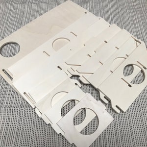 Large slot together multi chamber house for hamsters, made from formaldehyde free non toxic poplar plywood. Has 6 internal chambers, which are configurable to suit the quantity and sizes required. Shown as individual items prior to assembly.