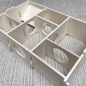 Large slot together multi chamber house for hamsters, made from formaldehyde free non toxic poplar plywood. Has 6 internal chambers, which are configurable to suit the quantity and sizes required. Shown with lid removed and ramp at rear left.