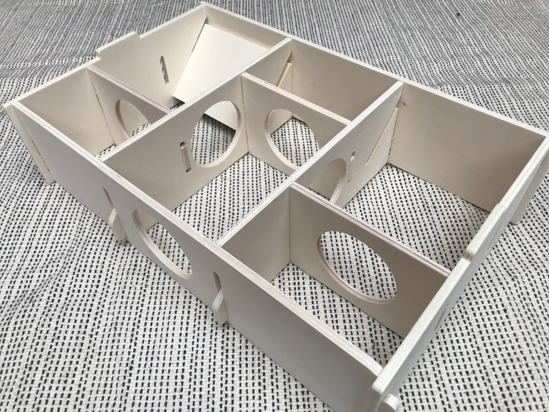 Large slot together multi chamber house for hamsters, made from formaldehyde free non toxic poplar plywood. Has 6 internal chambers, which are configurable to suit the quantity and sizes required. Shown with lid removed and ramp at rear left.