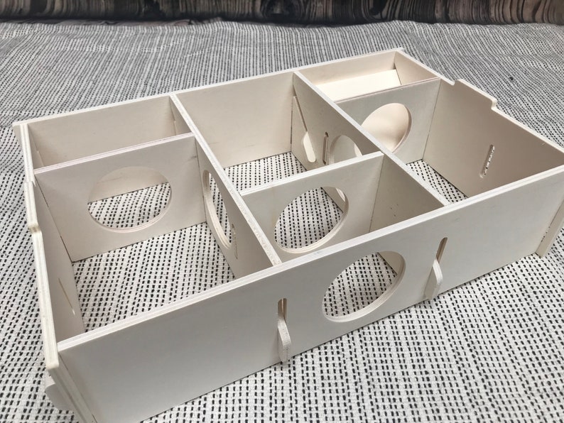 Large slot together multi chamber house for hamsters, made from formaldehyde free non toxic poplar plywood. Has 6 internal chambers, which are configurable to suit the quantity and sizes required. Shown with lid removed and ramp at rear right.