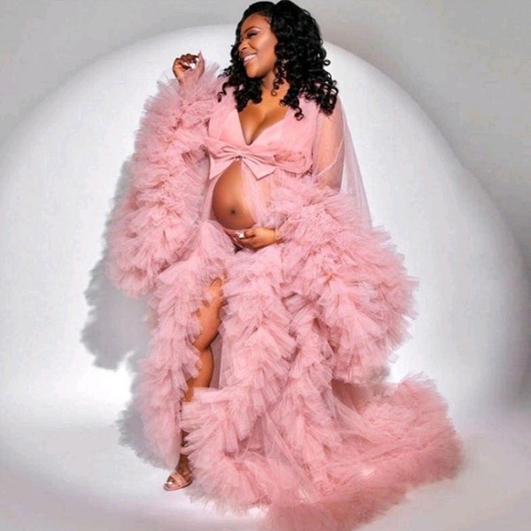 Hire Maternity photo shoot gown  .Pink one size tulle  ruffles gown . for pregnancy photoshoot. Message me first before purchasing.