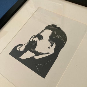Friedrich Nietzsche: A hand carved and hand printed portrait of the German philosopher.