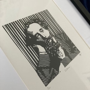 Charles Dickens: Hand carved and hand printed portrait of the famed English writer of A Christmas Carol and Oliver Twist among others..
