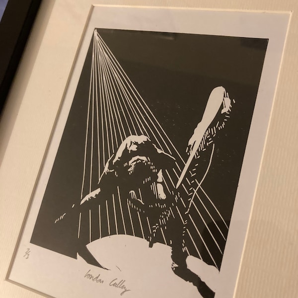 London Calling: Handcarved and hand printed portrait of Clash bassist Paul Simonon smashing his guitar. London Calling album cover.