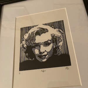Marilyn Monroe: Hand carved and hand printed portrait of the late American actress, Norma Jean.