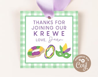 May include: Green and white checkered thank you tag with purple text that says "Thanks for joining our Krewe Love, Dean". The tag features a purple, green, and yellow donut, beads, and mask.