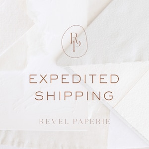 May include: White paper background with a brown circle logo with the letters RP inside. The text "EXPEDITED SHIPPING" and "REVEL PAPERIE" is written in brown below the logo.