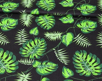 Monstera print on cotton fabric by the yard, green leaves on black print, exotic jungle pattern on cotton