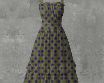 May include: Olive green sundress with purple floral pattern. The dress features a square neckline, adjustable straps, and a fitted waist. The skirt has two ruffled tiers. A stylish summer dress.
