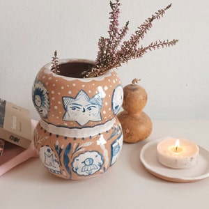 Hand-Painted Terracotta Vase with Whimsical Illustrations