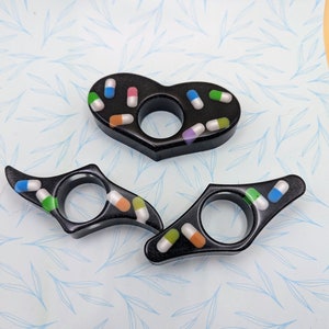 Pill Thumb Page Resin Holder