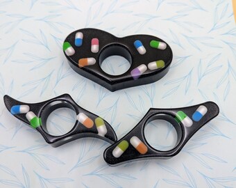 Pill Thumb Page Resin Holder