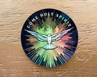 May include: A round sticker with a black background and a white dove with outstretched wings. The dove is surrounded by a colorful, radiating design with the words "Come Holy Spirit" in white text.