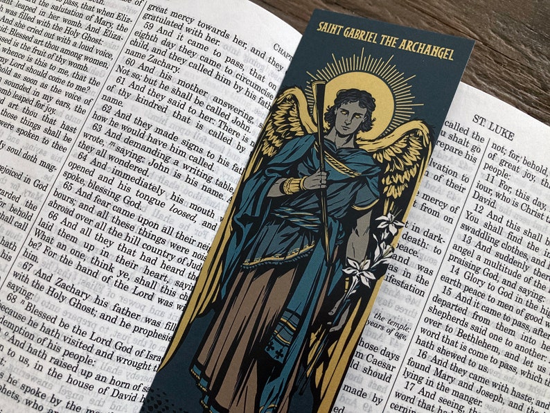 Saint Gabriel the Archangel illustrated by BARITUS Catholic Illustration, printed on bookmarks with metallic gold ink.