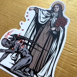 May include: A black and white illustration of a woman in a white robe holding a bouquet of red roses, standing over a kneeling figure with wings and flames. The woman is scattering rose petals.