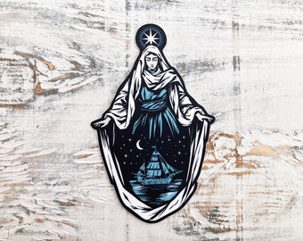 May include: A black and white illustration of a woman in a flowing robe with a star above her head. She is standing in front of a dark blue background with a crescent moon and a ship. The image is in a circular shape.