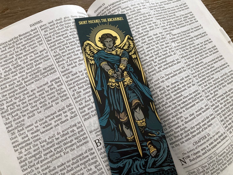 Saint Michael the Archangel illustrated by BARITUS Catholic Illustration, printed on bookmarks with metallic gold ink.