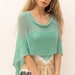 see more listings in the Ponchos d’été polyvalents section