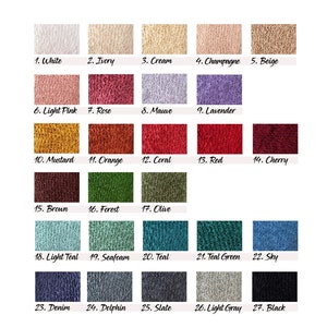 May include: Swatch card showing 27 different colors of fabric. The colors are arranged in rows and labeled with numbers and names. The colors include white, ivory, cream, champagne, beige, light pink, rose, mauve, lavender, mustard, orange, coral, red, cherry, brown, forest, olive, light teal, seafoam, teal, teal green, sky, denim, dolphin, slate, light gray, and black.